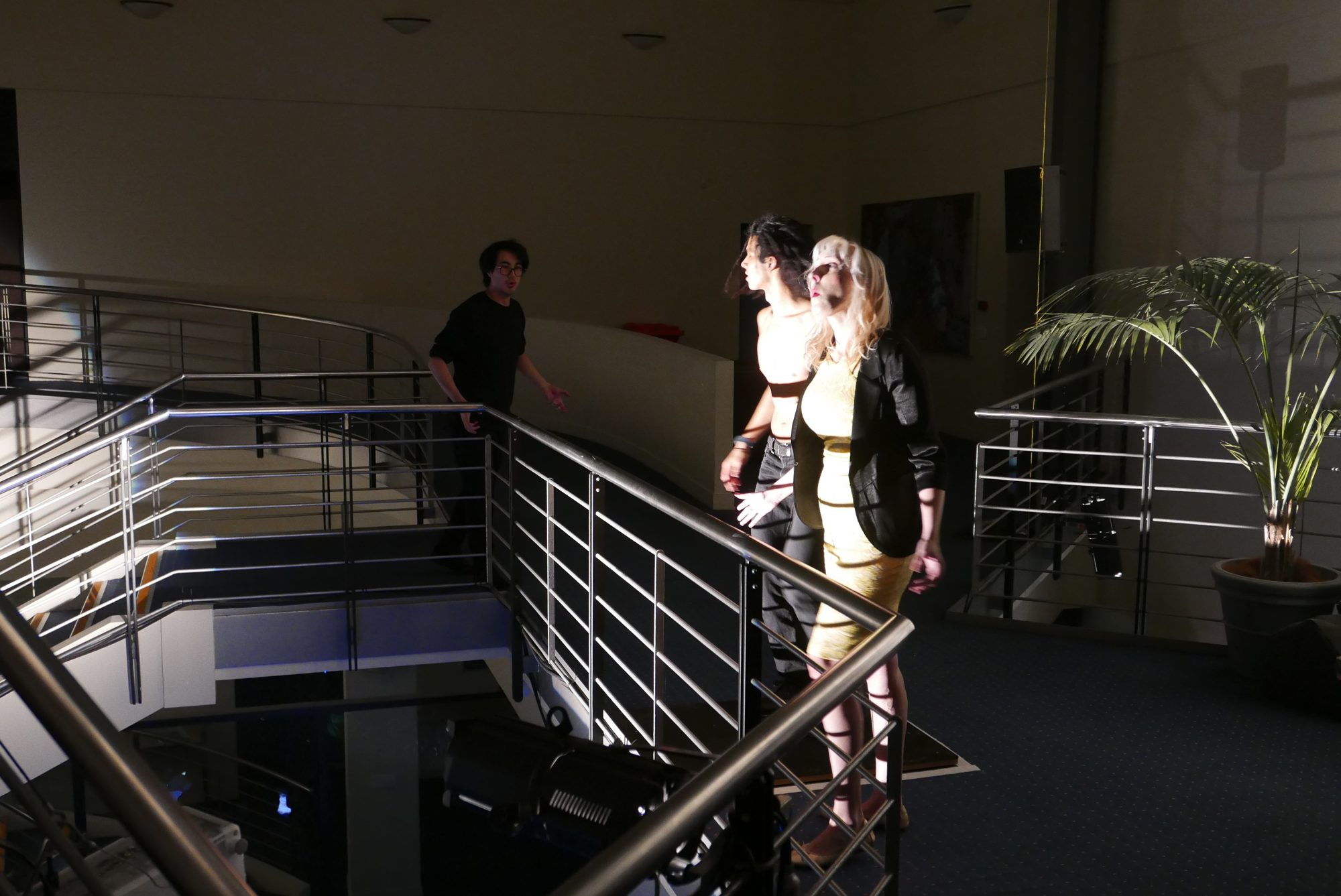Performers on the stairs and landing of the City Hall atrium